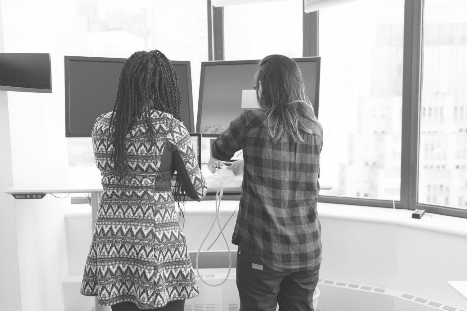 Professional team reviewing keyword strategy reports and search performance metrics