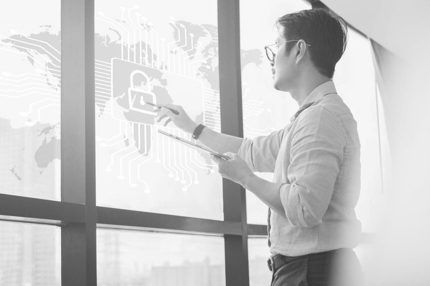 Student analyzing keyword research data on multiple screens for remote learning optimization